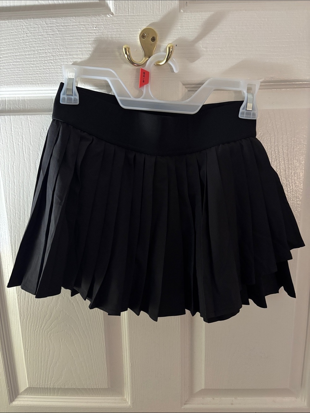 Black pleated tennis skirt
